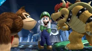 Luigi performing an Up Taunt next to Donkey Kong and Bowser.