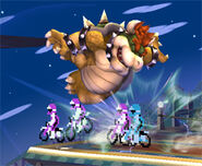 Bowser being hit by the Excitebikes.