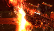 Ifrit tips over the stage with Hellfire.