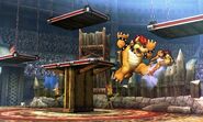 Bowser golpeando a Samus en el Coliseo de Regna Ferox.