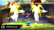 Bloque POW, que al tocar el suelo, envía los oponentes hacia arriba en Super Smash Bros. para Wii U.