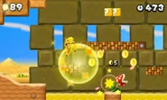 Mario dorado en New Super Mario Bros 2.jpg (82 kB) Mario dorado (gracias al objeto Flor dorada).