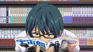 6 Utsumi reads a magazine