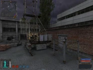 Just inside the big doorway.