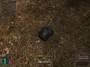 Backpack of WeaklingStash.jpg (146 KB) Near the bushes on the right.