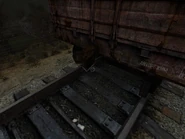 Jump onto this coupling and then straight up to the train car.