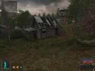 Go in the big doors and up the ladder.