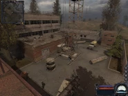 The small area of the building behind the crane houses the stairs to Lab X-18.