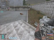 Try running off the wrecked wall, along the kerbing and jump onto the cistern foundation..