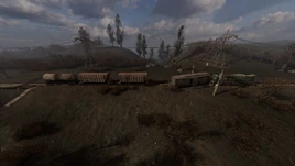 Encampment under embankment CS