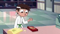 S2E4 Marco about to pick up the cassette tape