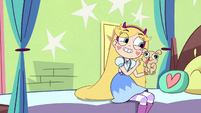 S4E13 Star Butterfly holding a laser puppy