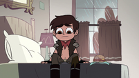 S2E31 Marco Diaz sits down on his bed