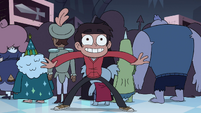 S4E11 Marco in front of the wallets display