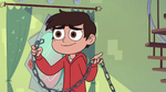 S3E18 Marco Diaz holding a smaller chain