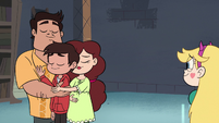 S3E32 Marco Diaz hugging his parents