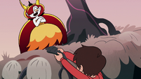 S2E31 Hekapoo standing over Marco Diaz