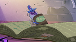 S2E28 Glossaryck holding a large container of pudding