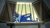 S2E35 Glossaryck lies next to window in his underwear