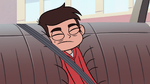 S2E24 Marco Diaz presses against the car's backseat