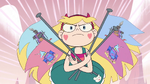 S2E15 Star Butterfly runs with armful of flags