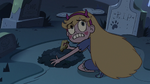 S3E9 Star Butterfly quickly burying the spell book