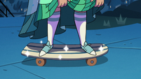 S2E27 Jackie reveals skateboard under her dress