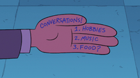 S2E27 Marco with conversation topics on his hand
