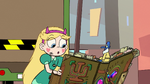 S2E14 Star Butterfly catches instruction book in her hands