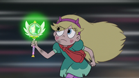 S3E1 Star looks at her wand while running