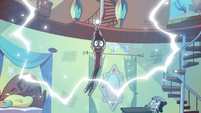 S3E23 Star's wand emits energy in Marco's hands