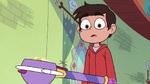 S3E23 Marco Diaz looking at Star's wand