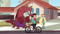 S1E13 Bicycle guy rides past