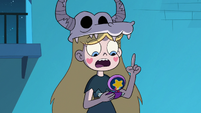 S2E21 Star Butterfly reading the ritual instructions