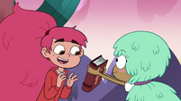 S4E12 Marco interested in wool-hair-do book