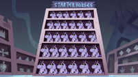 S3E15 Quest Buy display case of starter horses