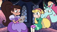 S3E16 Marco Diaz holding invitation from St