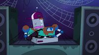 S2E33 Robot DJ covered in rust and cobwebs