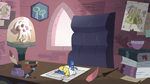 S3E31 Glossaryck lying on Buff Frog's desk