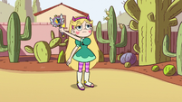 S2E14 Star Butterfly raises her right arm partway