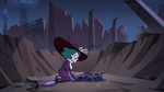 S3E38 Eclipsa kneels in front of Meteora's rags