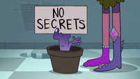 S2E1 Potted hand-plant with 'No Secrets' sign