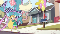 S2E29 Star Butterfly carrying a large present