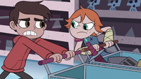 S3E15 Higgs pushing her cart against Marco's cart