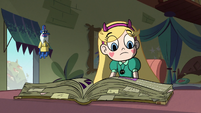 S2E25 Star Butterfly finishes reading Eclipsa's chapter