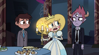 S3E24 Star Butterfly picking up a candelabra