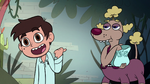 S1E14 Marco pointing at six-legged poodle