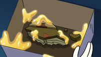 S4E10 Book of Spells piece covered in gold water