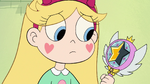 S2E23 Star Butterfly looking at her wand