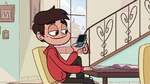 S1E7 Marco using his cell phone